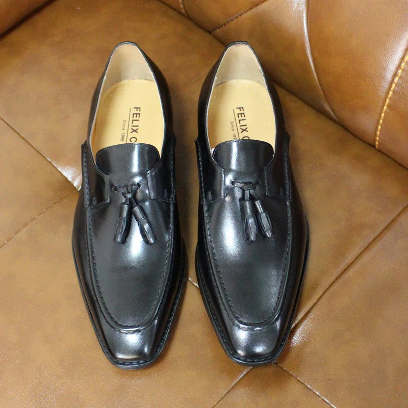 Premium casual leather loafers for men in black, brown, and blue colors with a sleek, low-profile design and durable rubber soles