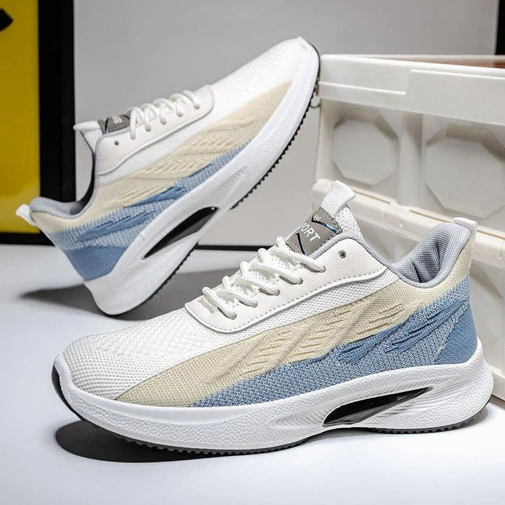 Breathable, comfortable color-blocked mesh sneakers for men with a durable rubber sole and secure lace-up closure