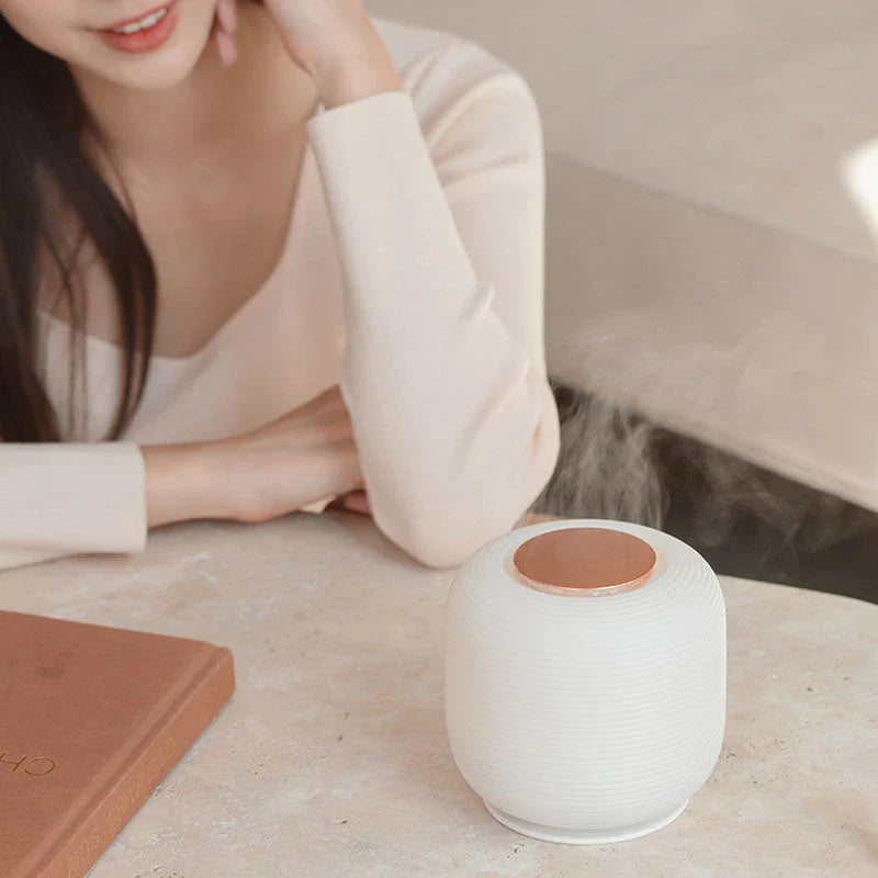 300ML USB Aromatherapy Diffuser with Soothing Night Light - Elevate your space with this compact, yet powerful diffuser that delivers calming aromatherapy mist and a soft night light.