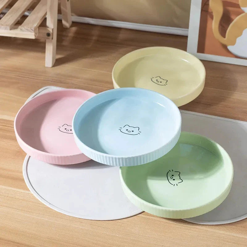 Adorable ceramic pet food and water bowl in pink color, perfect for cats and small dogs