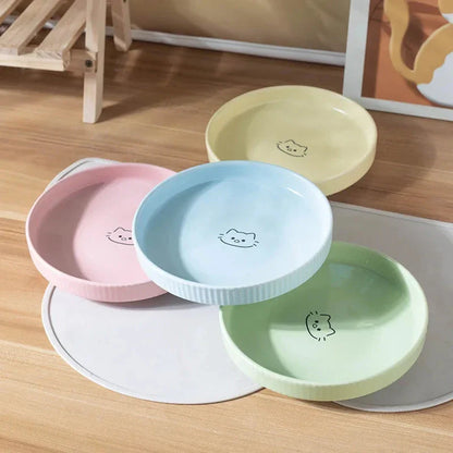 Adorable ceramic pet food and water bowl in pink color, perfect for cats and small dogs