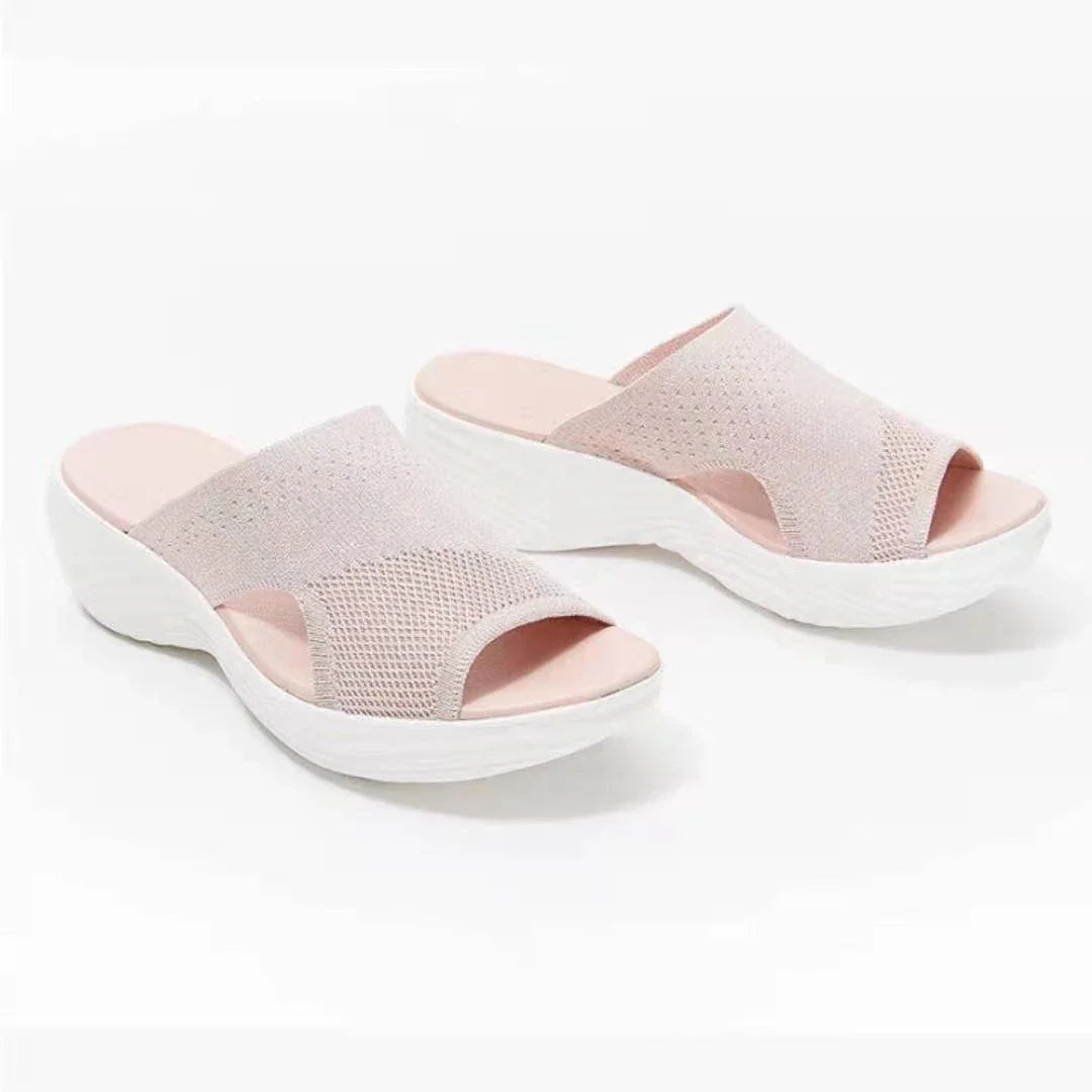 Comfortable plus-size women's sandals in various colors, featuring a fashionable and supportive design for warm-weather activities.