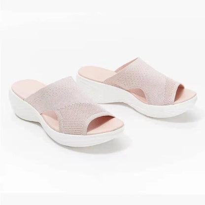 Comfortable plus-size women's sandals in various colors, featuring a fashionable and supportive design for warm-weather activities.