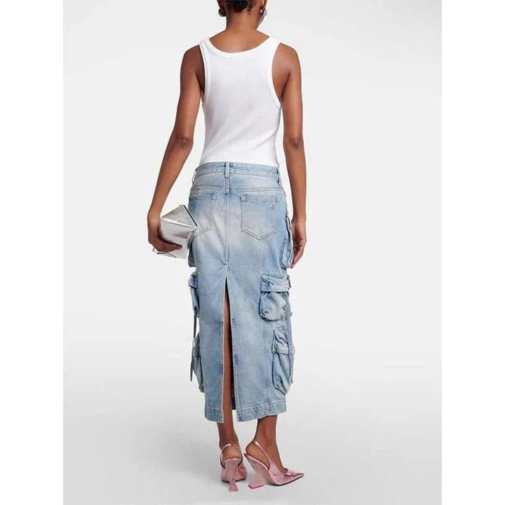 A high-waisted denim skirt with a distressed ribbon slit, perfect for adding a touch of fashionable flair to your spring wardrobe.