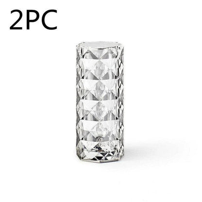 Elegant diamond-inspired crystal lamp with touch-sensitive dimming controls, providing adjustable ambient lighting for bedrooms and living spaces.