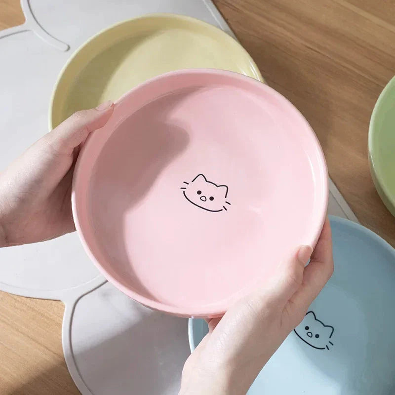 Adorable ceramic pet food and water bowl in pink color, perfect for cats and small dogs