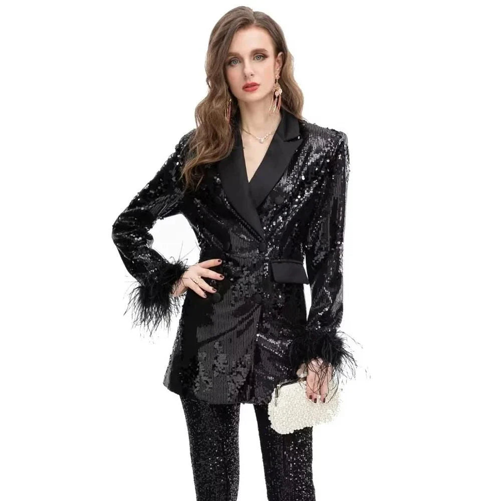 Elegant double-breasted blazer with feather and sequin details, offering timeless style and versatility for any occasion.