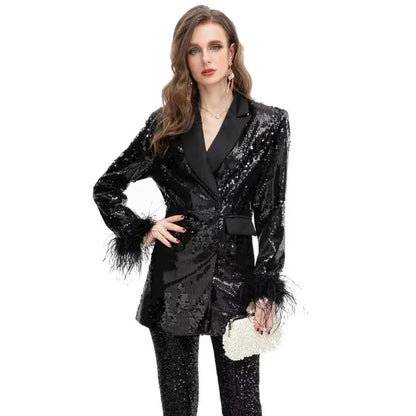 Elegant double-breasted blazer with feather and sequin details, offering timeless style and versatility for any occasion.