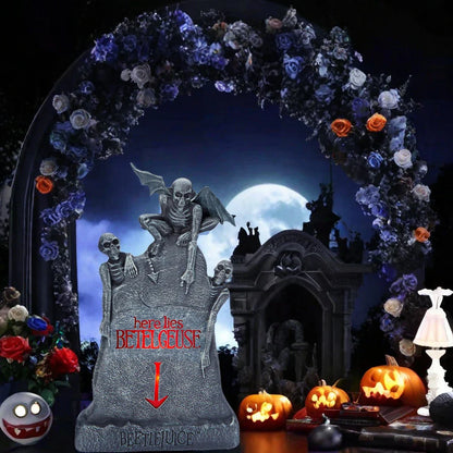 Glowing ghost skull tombstone decor with a spooky, otherworldly glow for Halloween