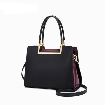 Elegant and spacious black leather tote bag with multiple compartments and a luxurious design
