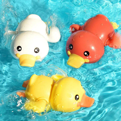 A set of colorful clockwork bathing ducks swimming in the water, providing fun and engaging bath time entertainment for children aged 0-6 years.