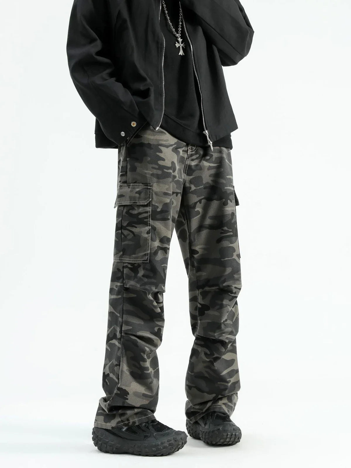 Stylish paratrooper denim trousers with a mid-waist silhouette and straight leg cut, featuring a camouflage pattern and premium cotton construction for rugged, versatile wear.