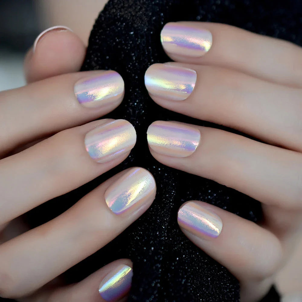 Chrome iridescent press-on nails with short round glossy tips, offering a dazzling, salon-quality manicure at home