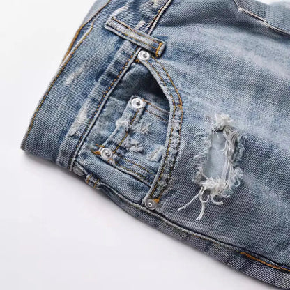 Premium distressed denim jeans with ripped detailing, perfect for casual streetwear style
