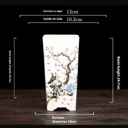 Elegant square ceramic planter in white with a Chinese-inspired design, suitable for indoor plants like asparagus fern and orchid.