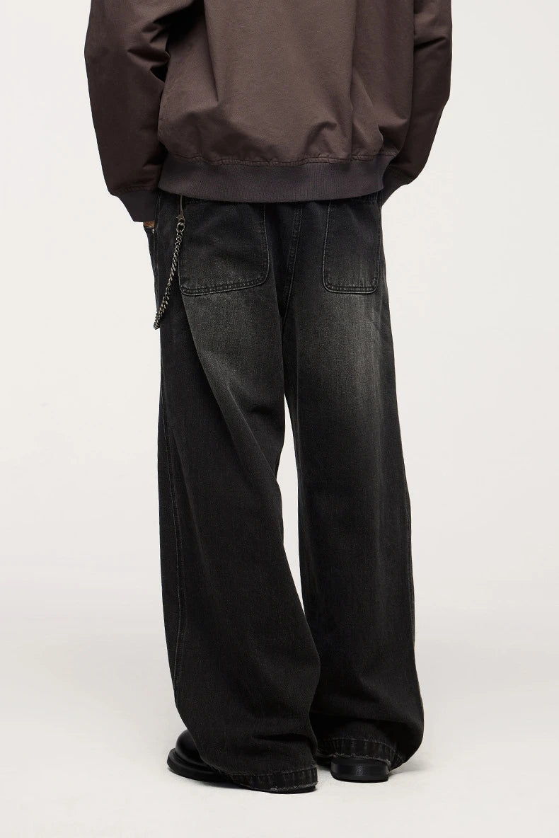 Men's relaxed fit retro straight-leg jeans in black, gray, and denim blue with vintage-inspired details