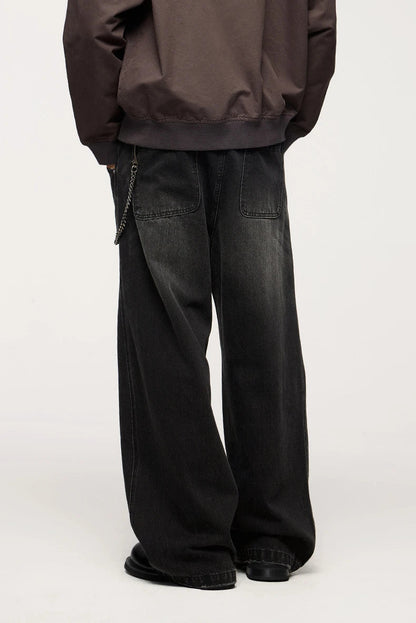 Men's relaxed fit retro straight-leg jeans in black, gray, and denim blue with vintage-inspired details