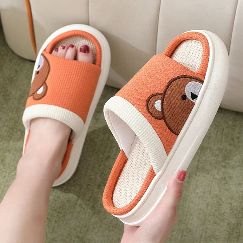 Cozy cartoon bear design linen slippers with non-slip, breathable sole for comfortable indoor wear