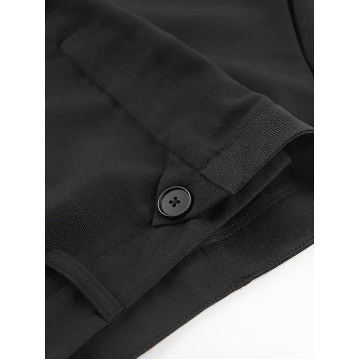 Elegant black ankle-length a-line skirt with pockets, made from a premium blend of polyester, spandex, and viscose for a comfortable, non-stretch fit.