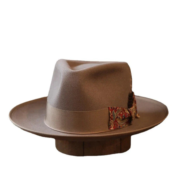 A beige wool top hat with a conical crown design, providing a classic and sophisticated look for formal and casual wear.