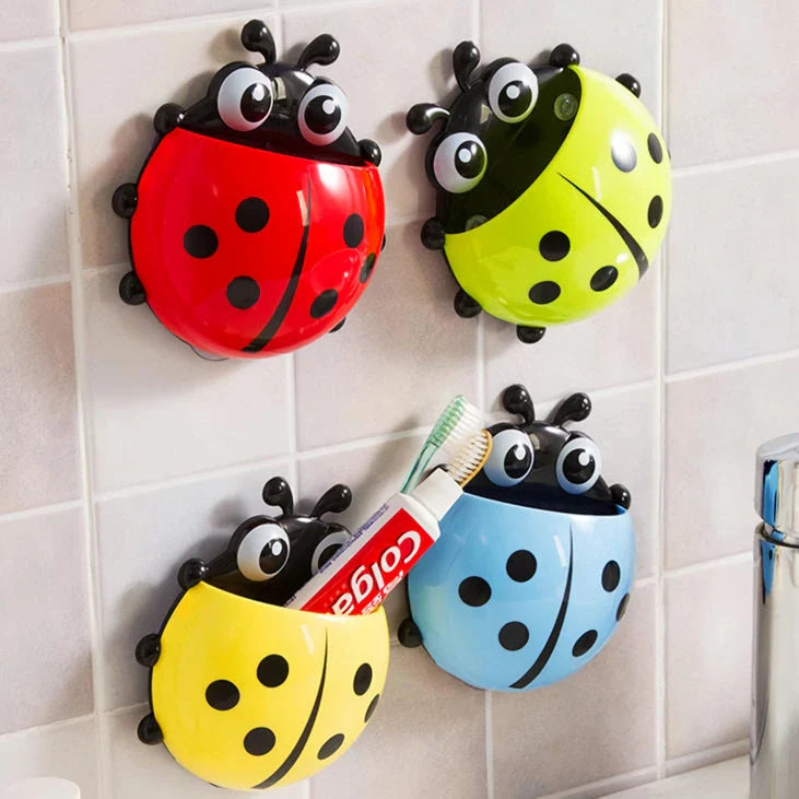 Colorful ladybug-shaped toothbrush holder with suction cup for easy wall mounting and organized storage
