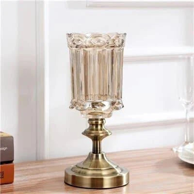 Elegant metal and glass vase in various sizes for home decor, featuring a sleek and versatile design
