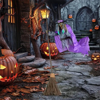 Large 6-foot animated floating witch decoration for outdoor Halloween, with lifelike facial features and flowing purple skirt