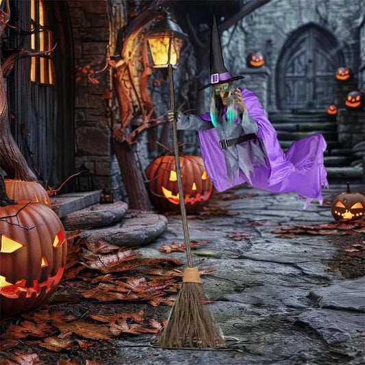 Large 6-foot animated floating witch decoration for outdoor Halloween, with lifelike facial features and flowing purple skirt
