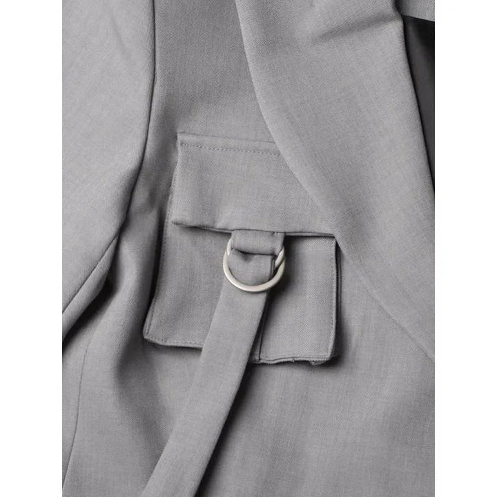 Stylish patchwork windbreaker trench coat with notched collar, button detailing, and flattering wide-waisted cut