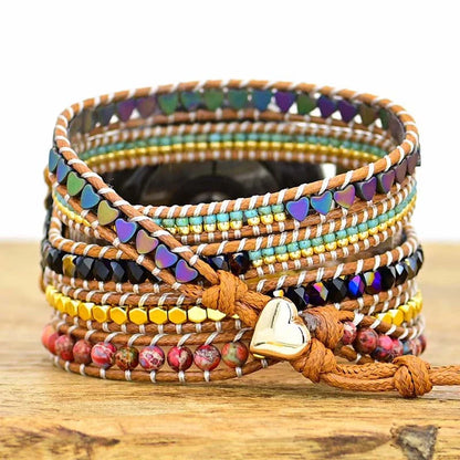Stylish stone woven watch strap with natural beads and durable fabric design, compatible with various smartwatch sizes.