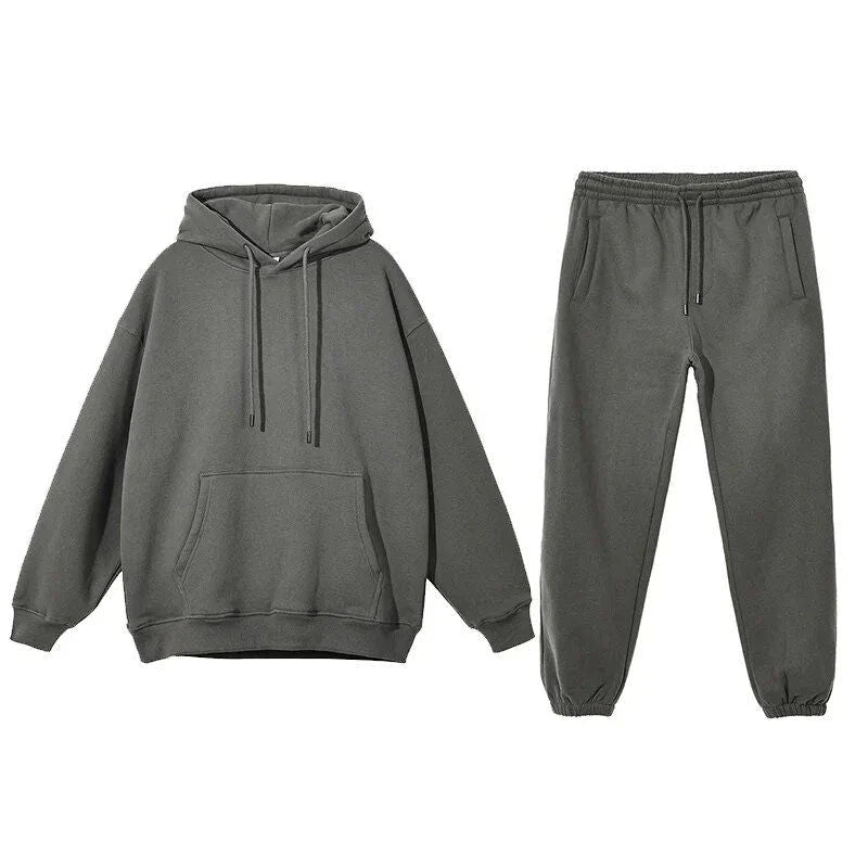 Cozy Fleece Hoodie and Sweatpants Set in Light Pink, featuring a relaxed fit and hooded design for maximum comfort and style.