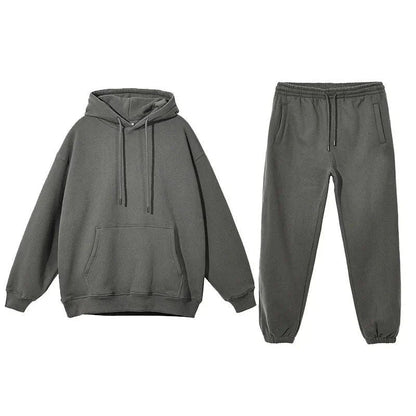 Cozy Fleece Hoodie and Sweatpants Set in Light Pink, featuring a relaxed fit and hooded design for maximum comfort and style.