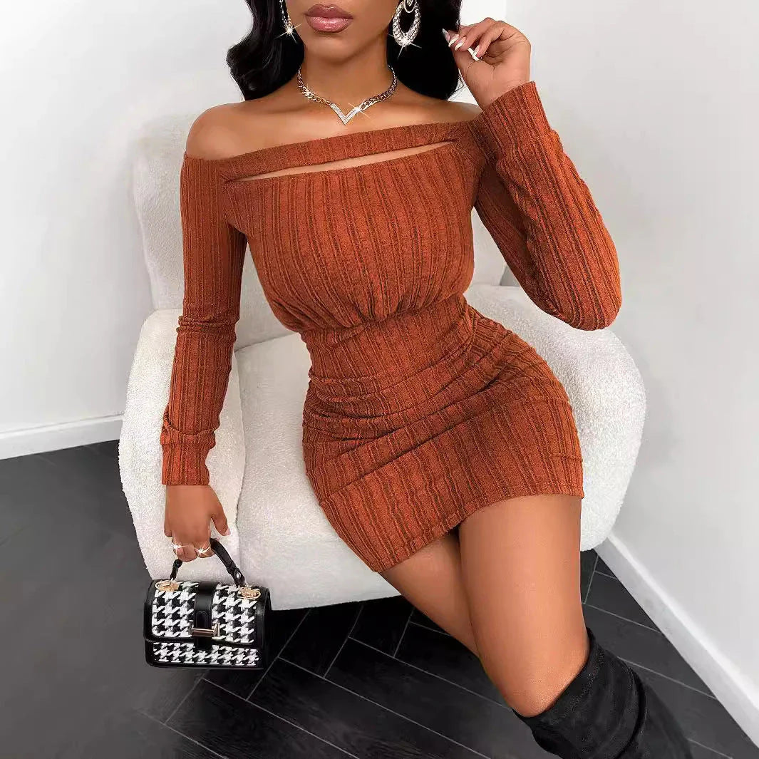 Alluring long sleeve midi dress in a solid brown color, featuring a sleek silhouette and nine-quarter sleeve length for sophisticated style.