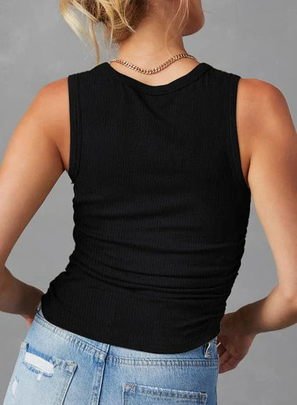 A sleeveless ribbed knit tank top for women in a variety of colors and sizes, featuring a crew neck design and pleated details for a stylish, casual look.