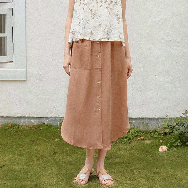 Elegant cotton linen maxi skirt with high waist, button-up front, and side split for a flowing, comfortable look