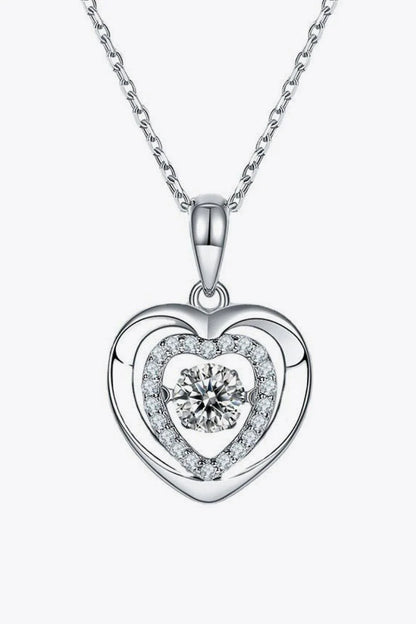 Captivating moissanite heart pendant necklace in sterling silver with a 0.5-carat center stone and sparkling accent stones