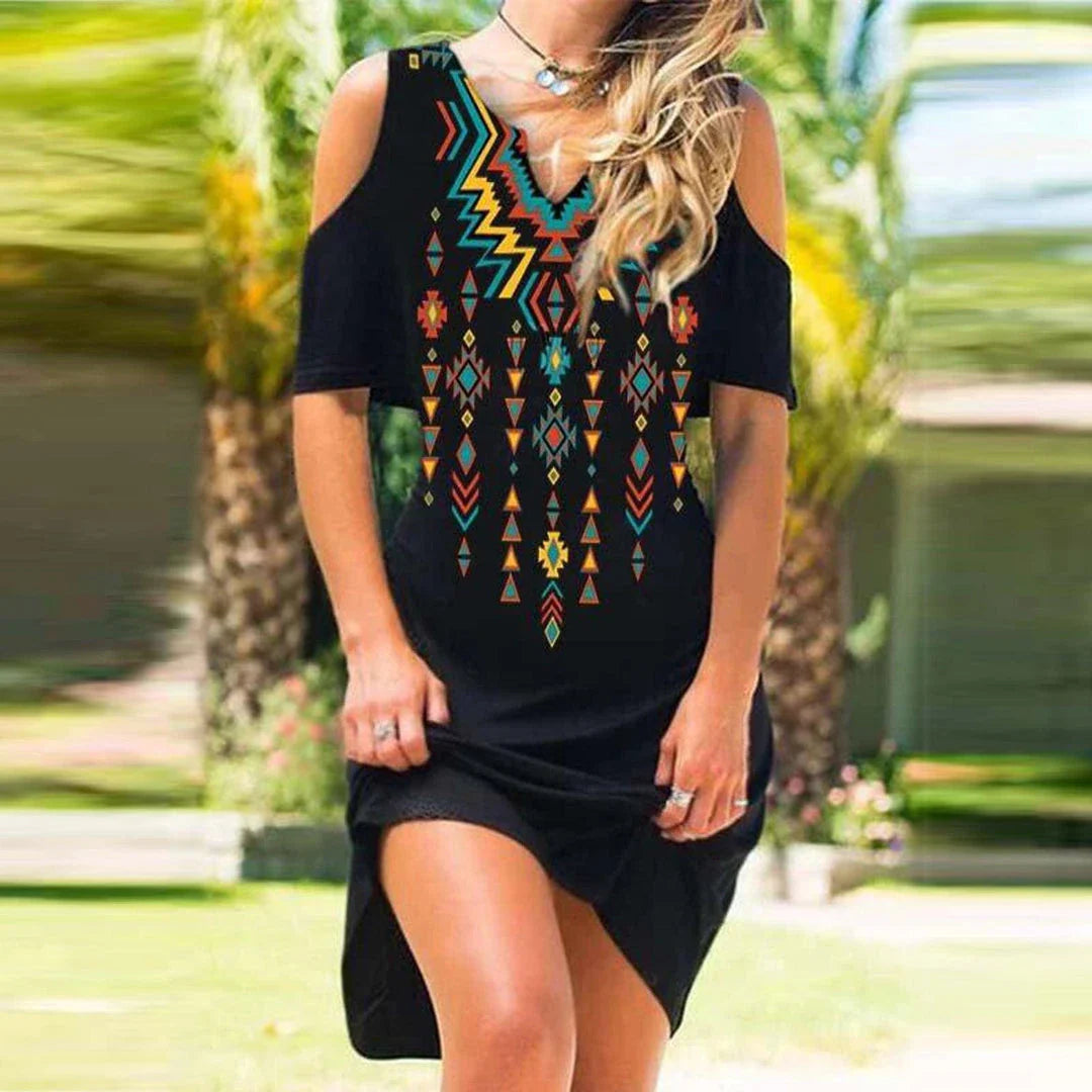 A stylish off-the-shoulder dress with an adjustable V-neck, made from a comfortable cotton blend fabric in a mid-length silhouette.