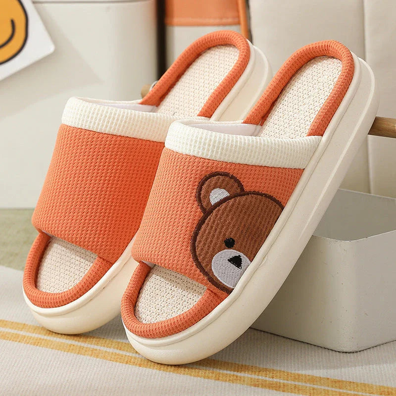 Cozy cartoon bear design linen slippers with non-slip, breathable sole for comfortable indoor wear