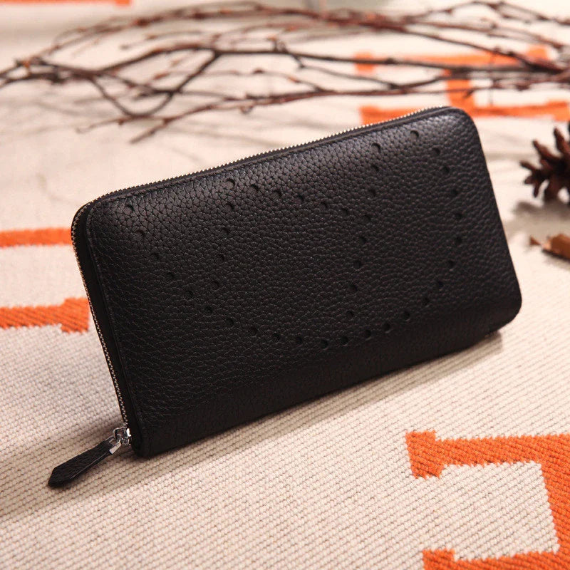 Premium cowhide leather clutch bag with lychee pattern design, featuring a medium-sized square shape and versatile style