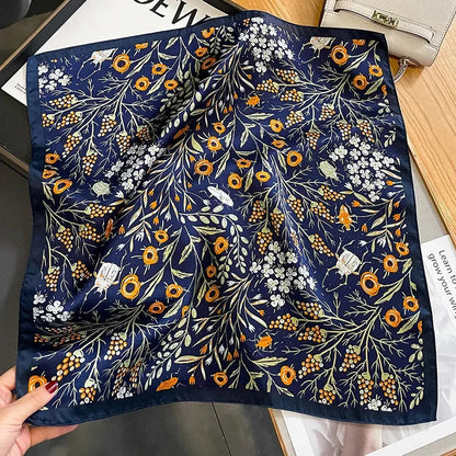 Floral print silk scarf in navy color, a versatile accessory for effortless style