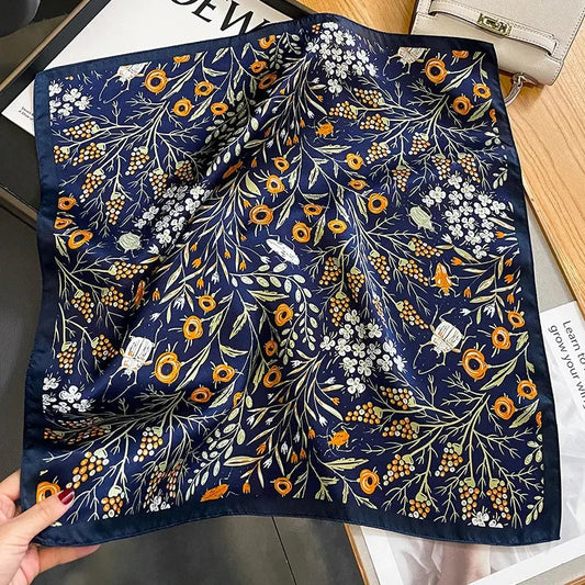Floral print silk scarf in navy color, a versatile accessory for effortless style