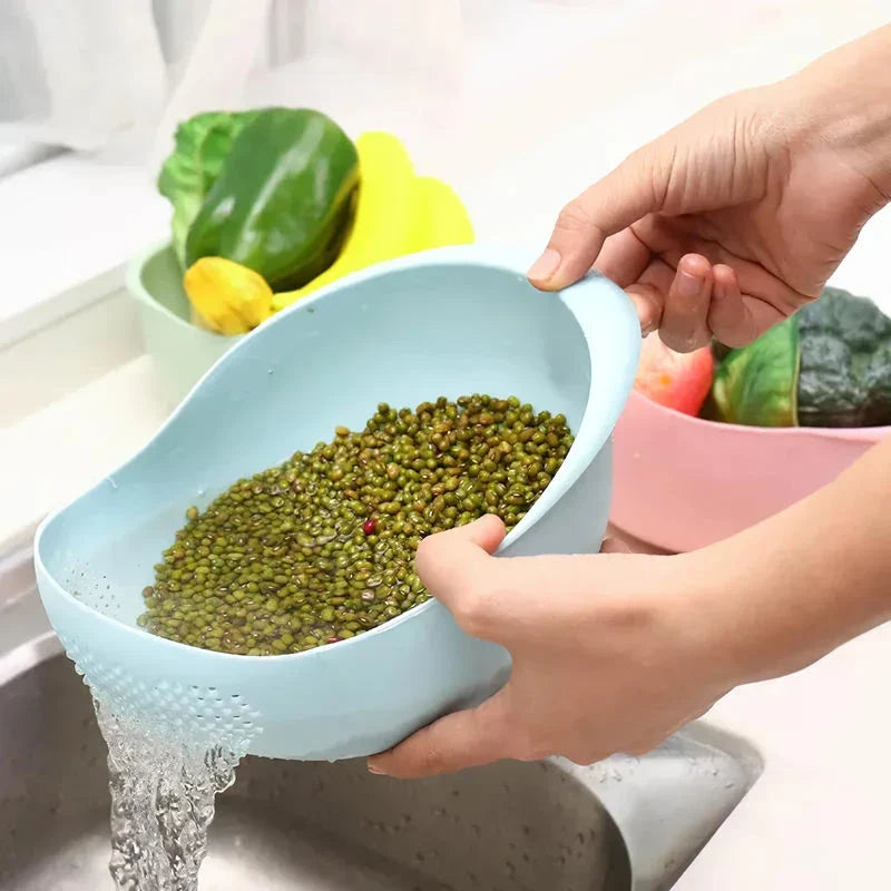 A multi-purpose kitchen drain basket with handles, made of high-quality polypropylene material for efficient draining and easy cleaning.