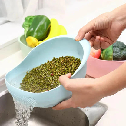 A multi-purpose kitchen drain basket with handles, made of high-quality polypropylene material for efficient draining and easy cleaning.