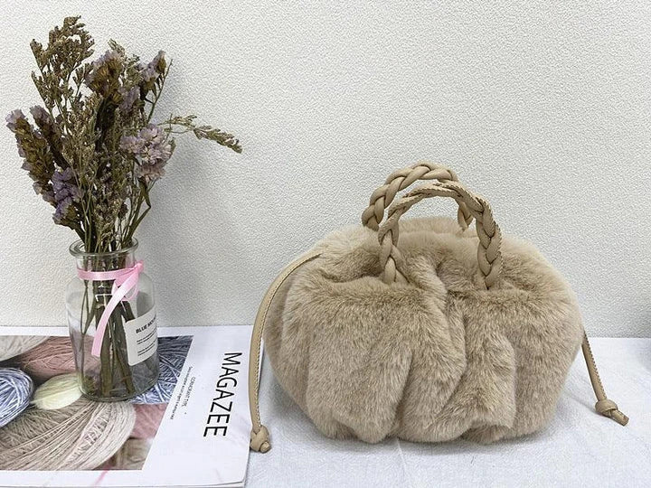 Elegant pleated leather and mink fur handbag in various colors, featuring a chic and modern cloud-like design
