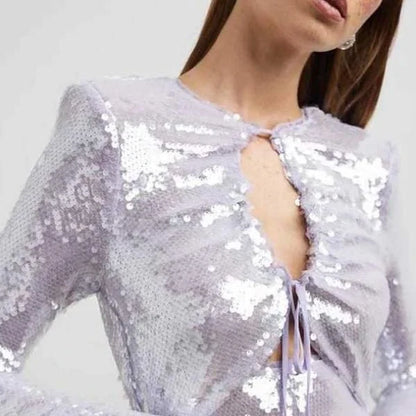 Glamorous purple sequin mini dress with O-neck neckline and long sleeves for a stylish and comfortable cocktail party look