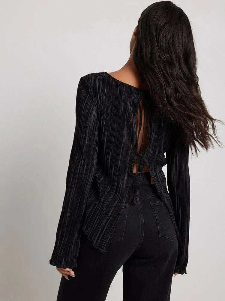 Chic pink lace-up summer bodycon blouse with delicate butterfly sleeves and pleated design