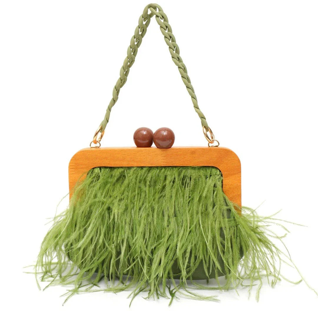 Elegant green feather evening clutch with chic acrylic chain, a stylish and practical accessory for formal and casual events