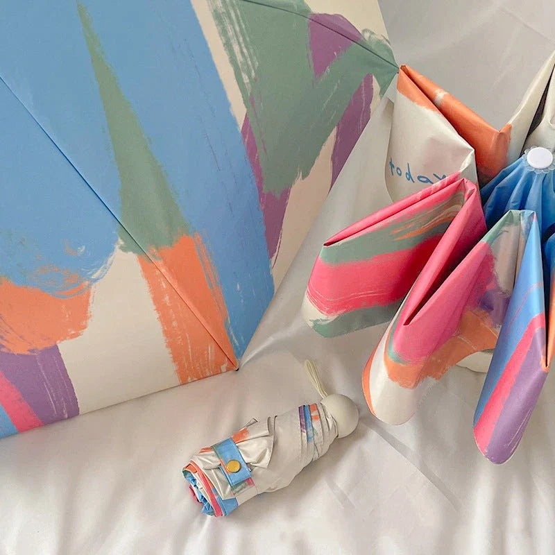 Hhomeenjoy Compact and Versatile UV-Shielding Mini Travel Umbrella