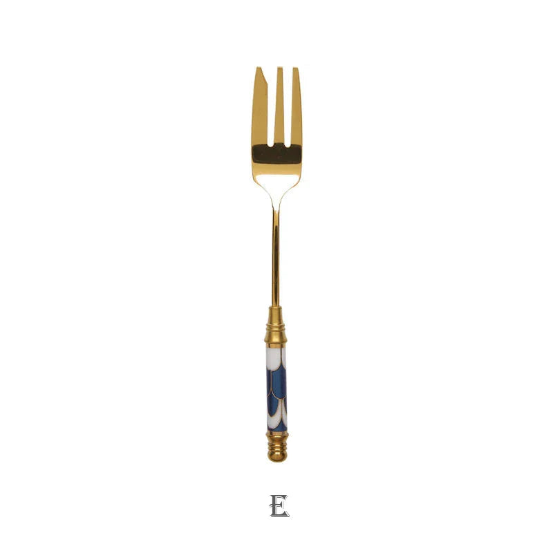 Elegant gold-plated dessert fork with intricate ceramic handle design