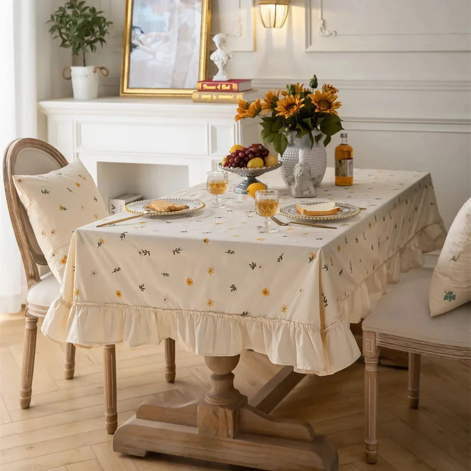Elegant cotton tablecloth with apricot embroidery and lotus leaf edge, perfect for dining decor